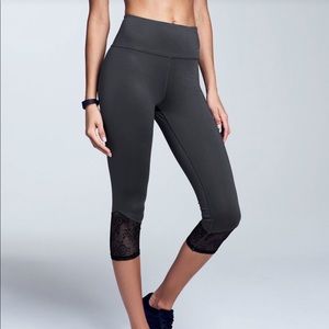 Adore Me cropped grey workout leggings with lace.